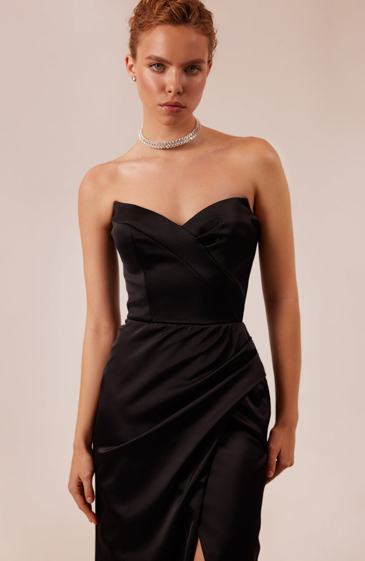 BLACK STRAPLESS EVENING GOWN WITH THIGH SLIT
